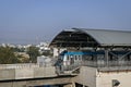 Rapid transit Hyderabad metro train exits Nampally station in the morning. The service has successfully completed one year in 2019