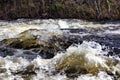 Rapid waters of river strong Royalty Free Stock Photo