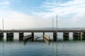 Rapperswil, SG / Switzerland - November 5, 2018: motorboat with female captain passes from the lower to the upper Lake Zurich thr