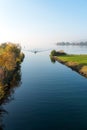 Rapperswil, SG / Switzerland - November 5, 2018: motorboat with tourist people passes from the lower to the upper Lake Zurich thro