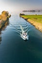 Rapperswil, SG / Switzerland - November 5, 2018: motorboat with tourist people passes from the lower to the upper Lake Zurich thro