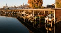 Rapperswil, SG / Switzerland - November 5, 2018: SBB train enters Rapperswil train station behind harbor in evening light bringing