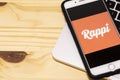 Rappi logo on the mobile device. Rappi is an on-demand delivery startup active in Argentina, Brazil, Chile, Colombia, Mexico, Peru