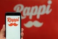 Rappi logo on the phone with the logo at the bottom, Rappi App