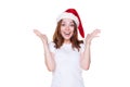 Rapturous young woman in santa hat