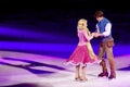 Rapunzel and Flynn dance during Disney on Ice