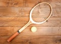 Raquet and in wood background Royalty Free Stock Photo