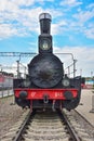 Rare black and red steam train in the museum of steam locomotives at the Riga station