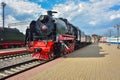 Rare black and red steam train Sergo Ordzhonikidze in the museum of steam locomotives at the Riga station