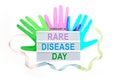 Rare Disease Day Poster or Banner Background. Top view Royalty Free Stock Photo