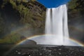 A rare double rainbow on the flying spray of Skogafoss waterfall in Iceland Royalty Free Stock Photo