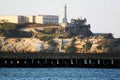 Rare view of Alcatraz Island behind a wharf