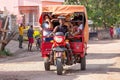 Rarely seen motor rickshaw on the city streets. Rickshaws are a common mode of transport in Madagascar.