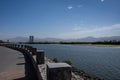 Ras al Khaimah, United Arab Emirates Corniche with mangroves, the khor, the exercise path and mountains on a sunny day