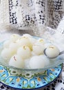 Rasagolla, a Bengali delicacy- served with saffron strands