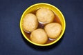 Rasgulla indian favorite sweet in a yellow bowel
