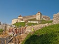 Workers reconstructing the defensive wall of Rasnov fortress Royalty Free Stock Photo