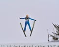 Rasnov, Romania - February 7: Unknown ski jumper competes in the FIS Ski Jumping World Cup Ladies Royalty Free Stock Photo