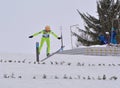 Rasnov, Romania - February 7: Unknown ski jumper competes in the FIS Ski Jumping World Cup Ladies Royalty Free Stock Photo