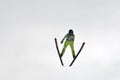 Rasnov, Romania - February 7: Unknown ski jumper competes in the FIS Ski Jumping World Cup Ladies on February 7, 2015 in Rasnov, Royalty Free Stock Photo