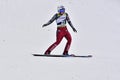 Rasnov, Romania - February 7: Unknown ski jumper competes in the FIS Ski Jumping World Cup Ladies on February 7, 2015 in Rasnov, Royalty Free Stock Photo