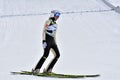 Rasnov, Romania - February 7: Unknown ski jumper competes in the FIS Ski Jumping World Cup Ladies on February 7, 2015 in Rasnov, Royalty Free Stock Photo