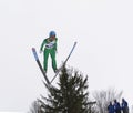 Rasnov, Romania - February 7: Unknown ski jumper competes in the FIS Ski Jumping World Cup Ladies on February 7, 2015 in Rasnov Royalty Free Stock Photo