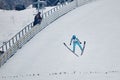 Rasnov, Romania - January 25: Unknown ski jumper competes in the FIS Ski Jumping World Cup Ladies Royalty Free Stock Photo