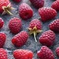 Raspberries on gray concrete background, square frame Royalty Free Stock Photo