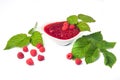 Raspberries jam with berries and leavies Royalty Free Stock Photo