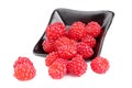 Raspberries in a plate, isolated on a white background Royalty Free Stock Photo