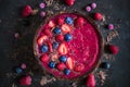 Raspberries smoothie in coconut bowl