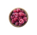 Raspberries in a wooden bowl isolated on white background. Top view. Raspberry closeup. Vegetarian or healthy eating. Juicy and de Royalty Free Stock Photo