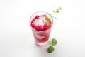 Raspberry alcoholic cocktail with liqueur, vodka, ice and mint on a white background. Raspberry Mojito. Refreshing cool drink, Royalty Free Stock Photo