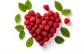 raspberry berry heart shape with leaves isolated on white background top view