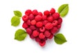 raspberry berry heart shape with leaves isolated on white background top view