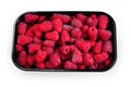 Raspberry in black container isolated on white background Royalty Free Stock Photo