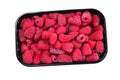 Raspberry in black container isolated on white background Royalty Free Stock Photo
