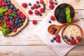 Raspberry, blueberry with mint and oatmeal breakfast or smoothie Royalty Free Stock Photo