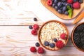 Raspberry, blueberry with mint and oatmeal breakfast or smoothie Royalty Free Stock Photo