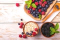 Raspberry, blueberry with mint and oatmeal breakfast or smoothie Royalty Free Stock Photo