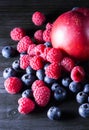 Raspberry, blueberry and nectarine on dark wooden background, st Royalty Free Stock Photo