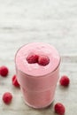 Raspberry and blueberry smoothie with berries on wooden background. Healthy vegetarian food Royalty Free Stock Photo