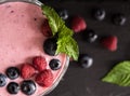 Raspberry and blueberry smoothie with mint top view berry cocktail superfood diet milk shake Royalty Free Stock Photo