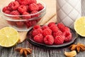 Raspberry bowl on wood