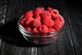 raspberry bowl on wood