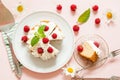 Raspberry Cake with whipped cream on pink background Royalty Free Stock Photo