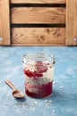 Raspberry chia seed yogurt pudding with muesli and fresh berries Royalty Free Stock Photo