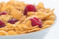 Raspberry and Cornflakes in a white Bowl