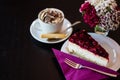 Topview of piece of raspberry cream cake on wooden table